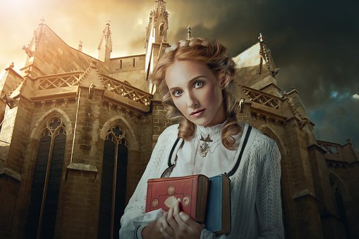 Come si studia storia. donna con un libro davanti ad una cattedrale
